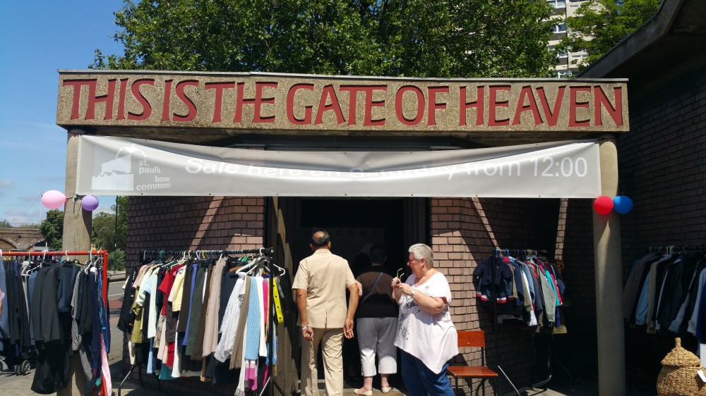 summer sale with people going in to church